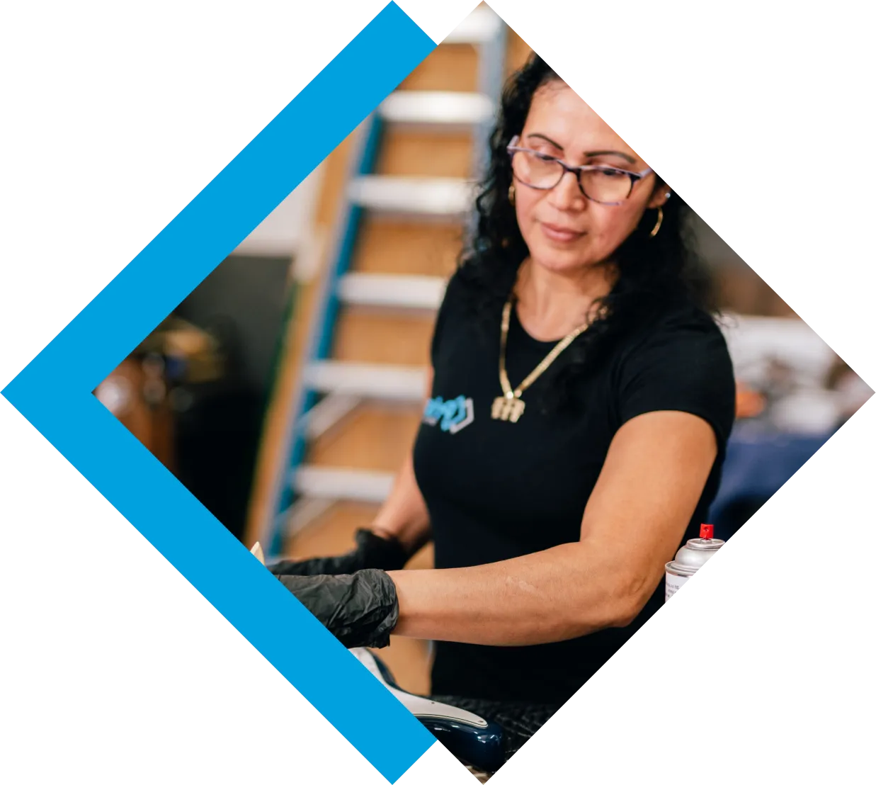 Prism technician restoring an item in a workshop