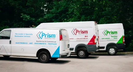 Three Prism service vans for Specialties, Art, and Textiles divisions