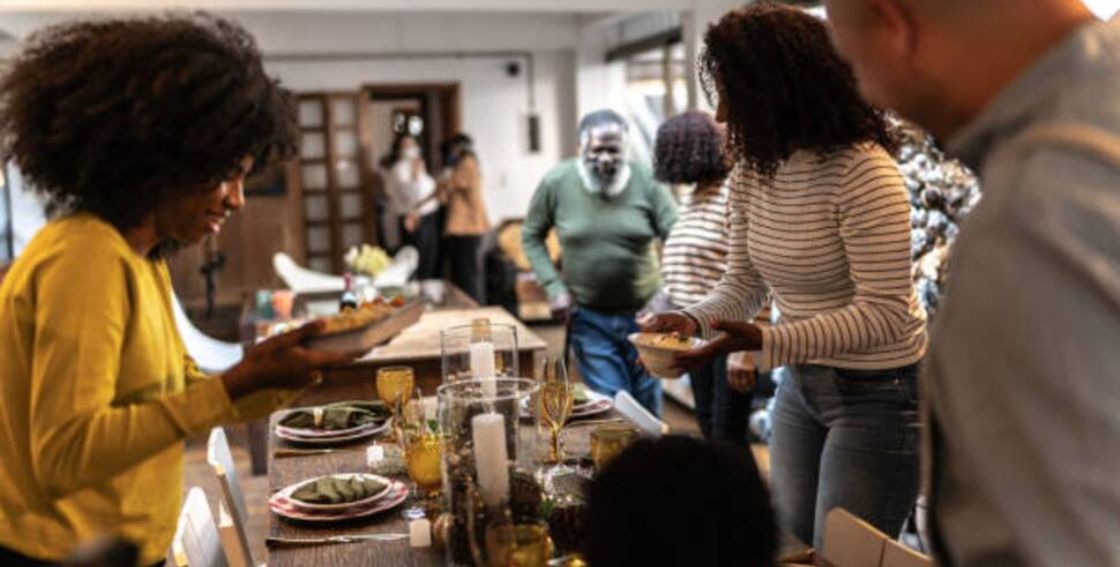 Family gathering in kitchen for feast