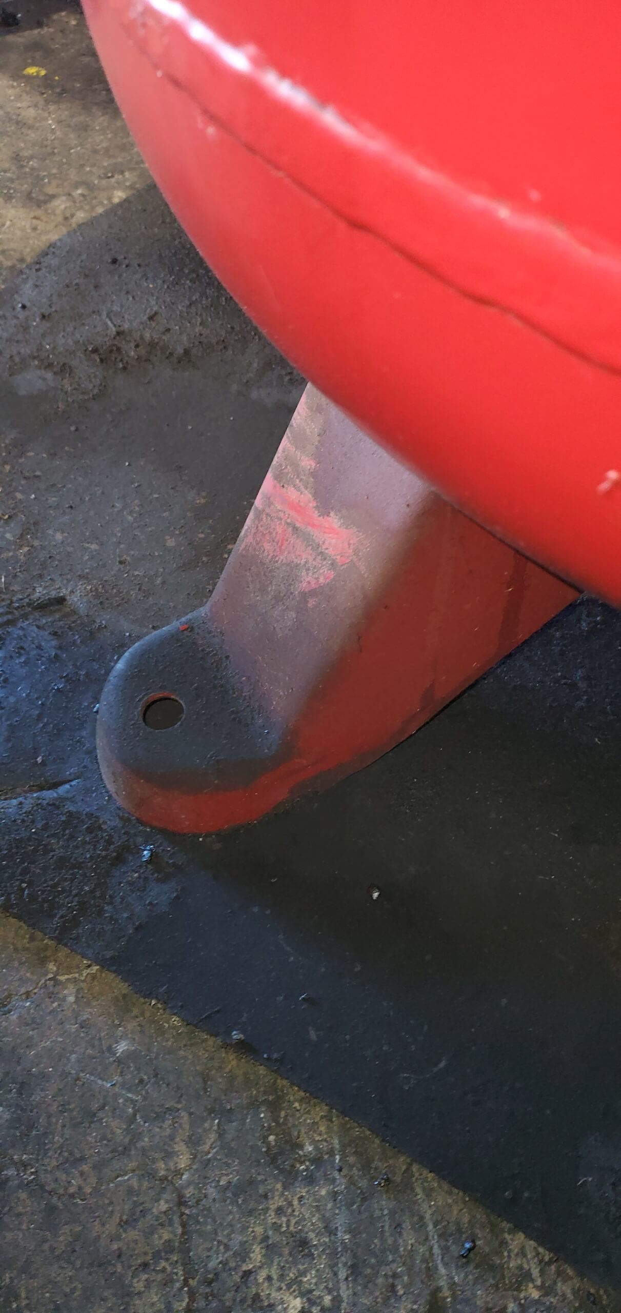 Metal canister with heavy contamination buildup before dry ice cleaning at a Columbus industrial facility