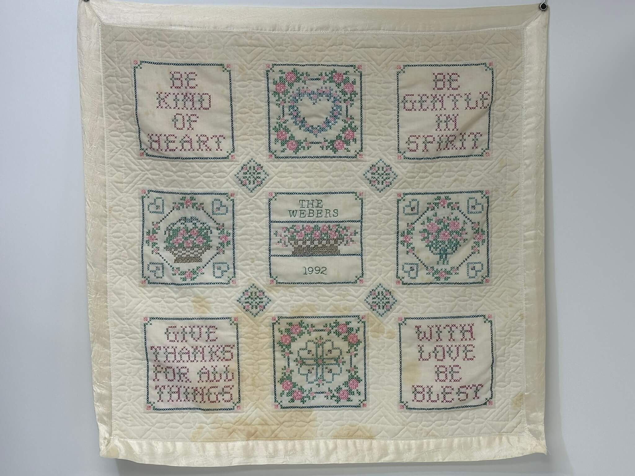 Vintage needlework collectible after full conservation cleaning &mdash; original threads and colors preserved